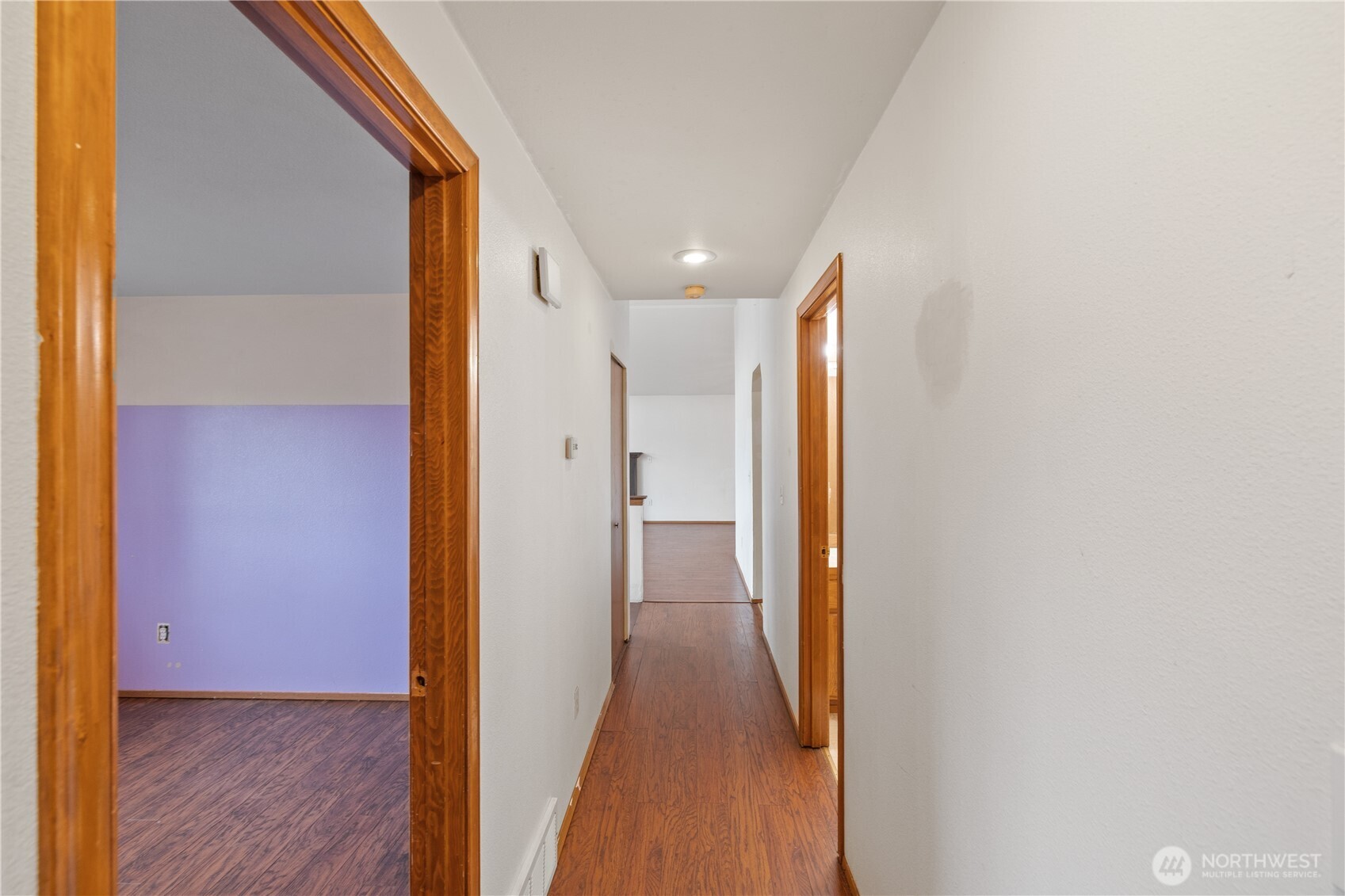 5411 158th Place Southwest Edmonds, WA 98026 - Photo 15 of 38 a view of a hallway with wooden floor