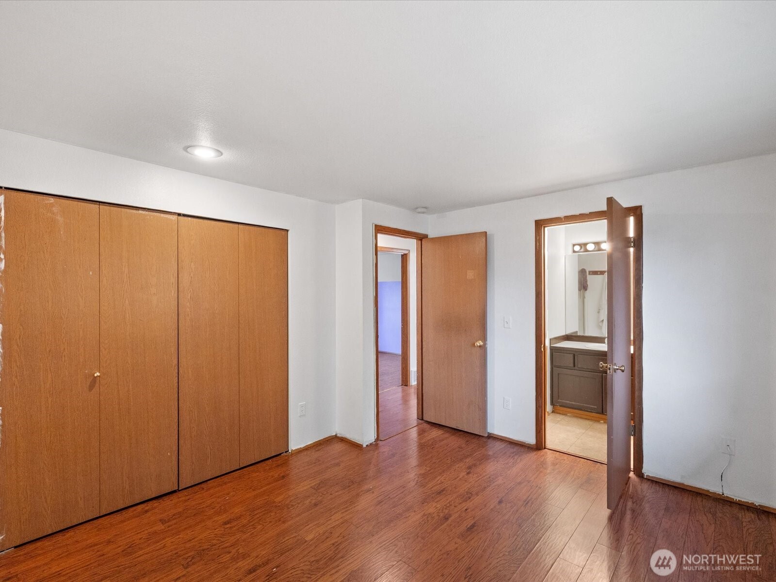 5411 158th Place Southwest Edmonds, WA 98026 - Photo 22 of 38 an empty room with wooden floor and closet