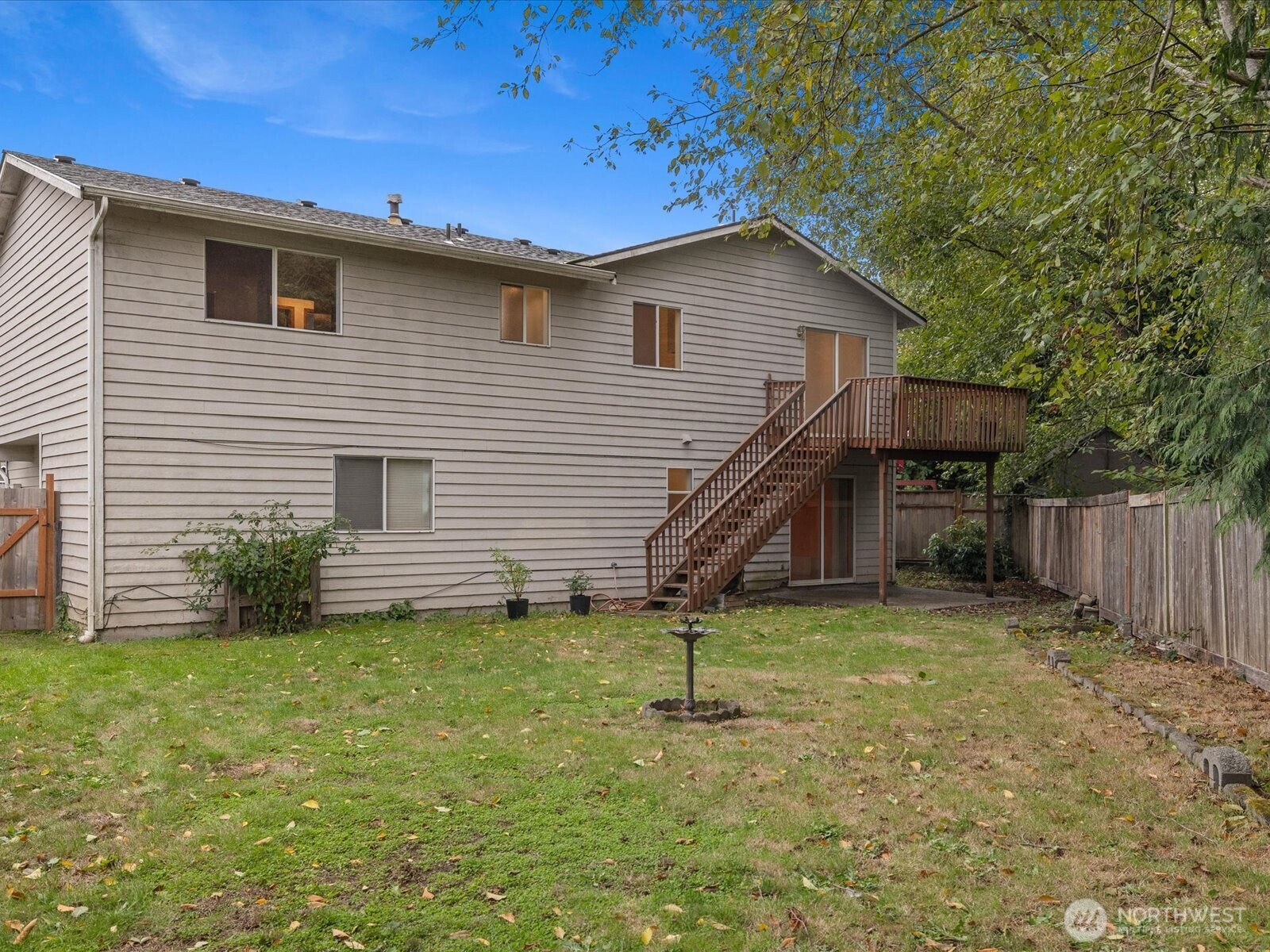5411 158th Place Southwest Edmonds, WA 98026 - Photo 34 of 38 a view of a backyard with a house