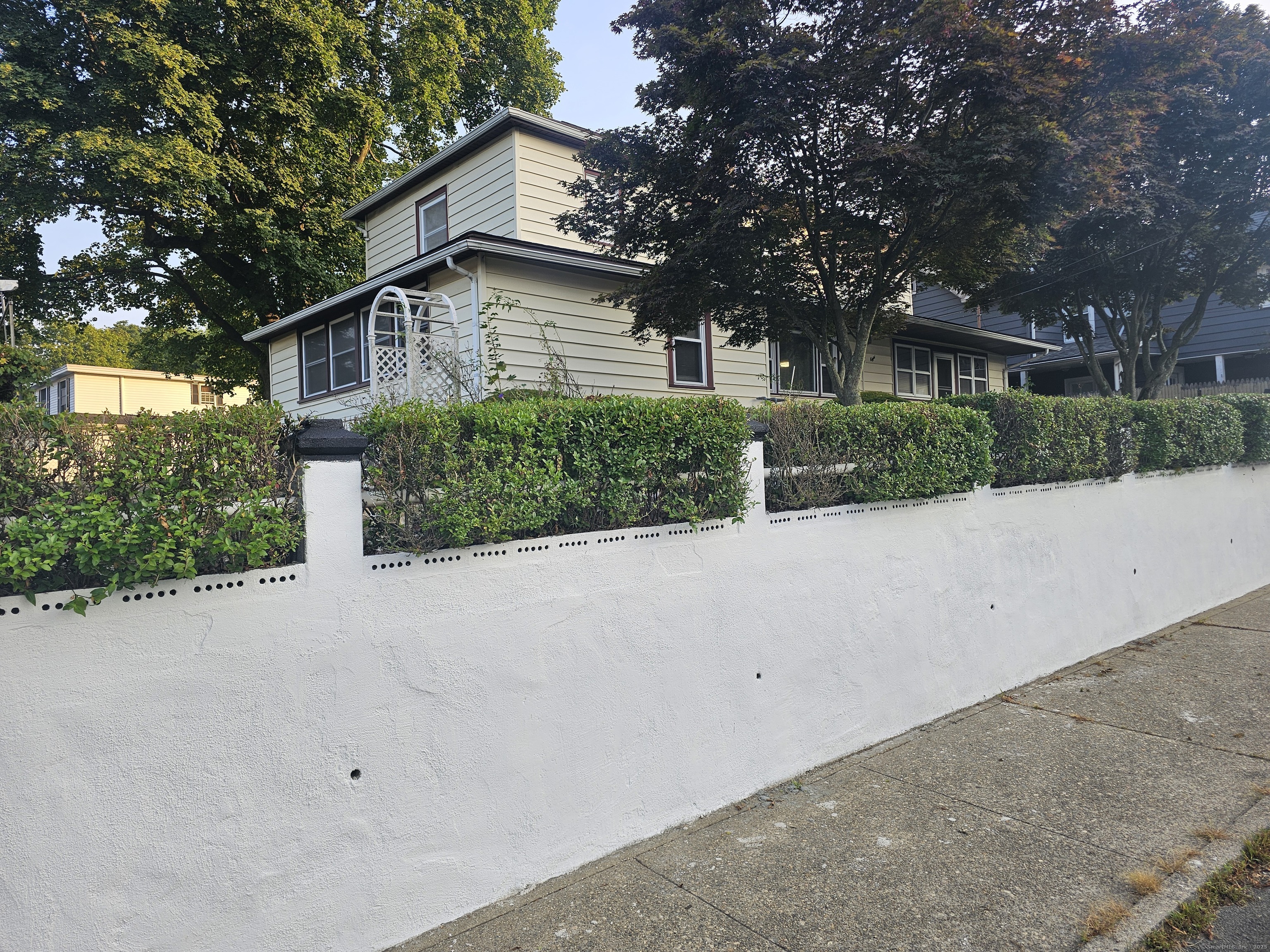 8 Cliff Street Naugatuck, CT 06770 - Photo 16 of 16 a front view of house with yard and green space