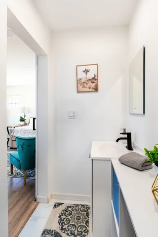 a room with a sink and a window