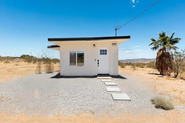 a view of a terrace with wooden fence