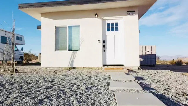 a view of a backyard of a house