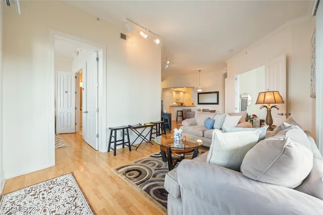 a living room with furniture and a table