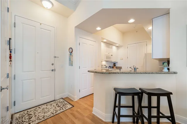 a view of dining area with cabinets