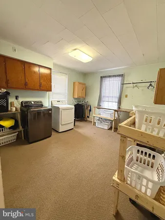 a room with furniture and a flat screen tv