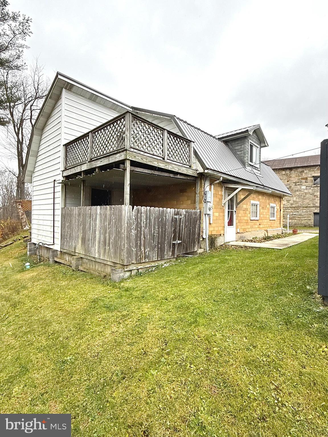 32 Blue Ball Road West Decatur, PA 16878 - Photo 28 of 32 a front view of a house with a yard