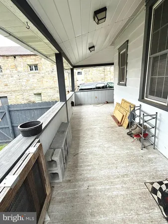 a view of swimming pool with seating space