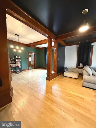 a view of a hall with furniture