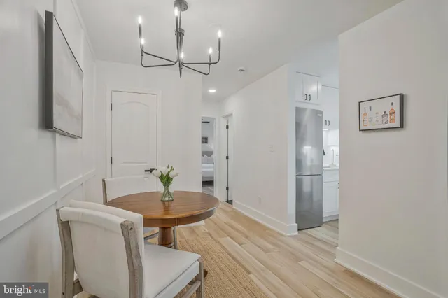 a view of a livingroom with furniture and wooden floor
