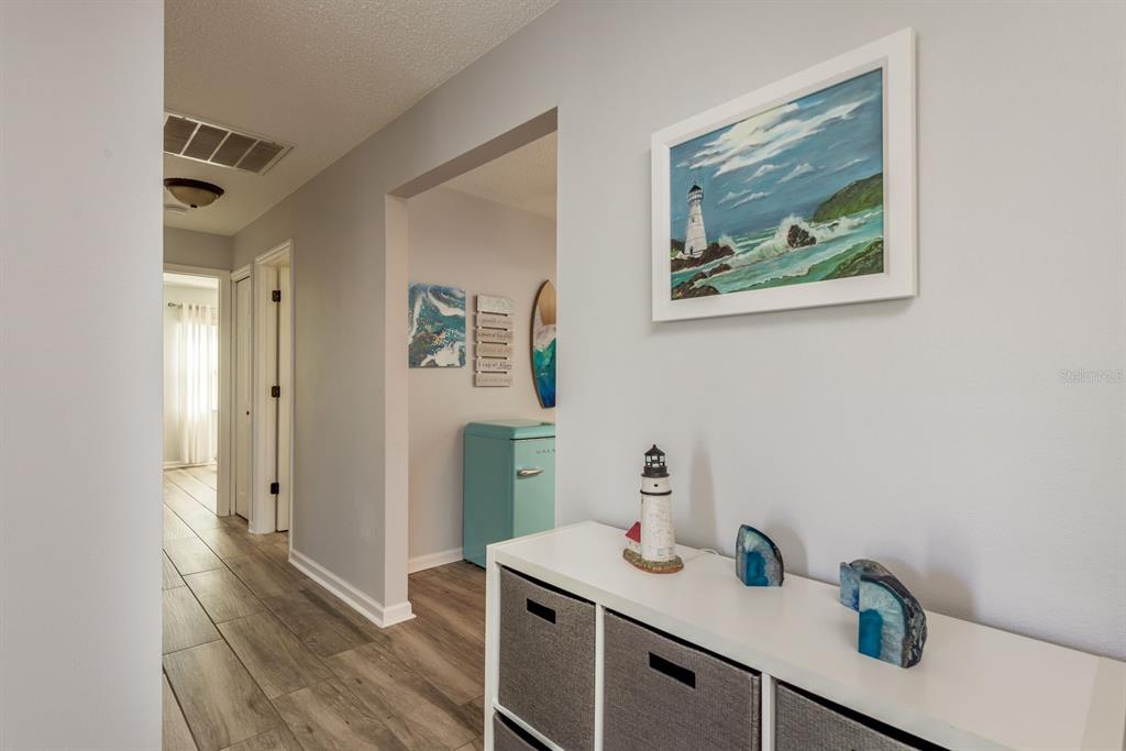 409 Stirling Terrace Dunedin, FL 34698 - Photo 9 of 17 a view of a hallway with workspace