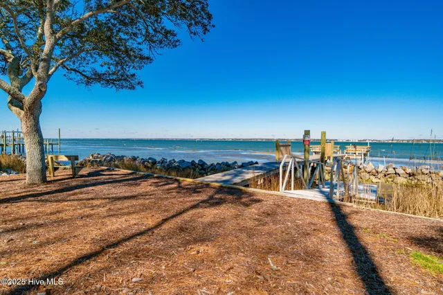 $675,000 | 102 Chestnut Court, Pine Knoll Shores, NC 28512