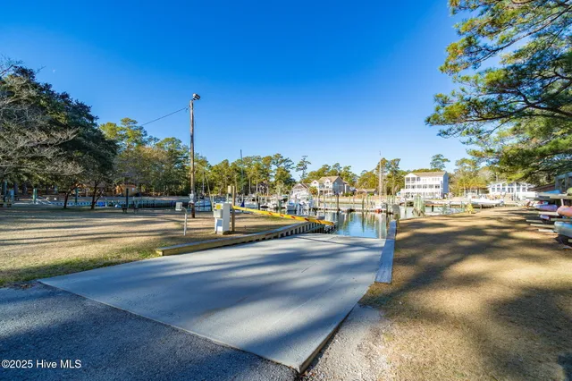 $675,000 | 102 Chestnut Court, Pine Knoll Shores, NC 28512