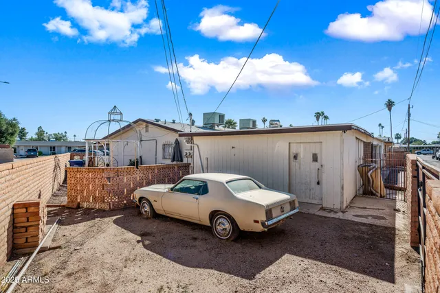 a car parked in front of a house