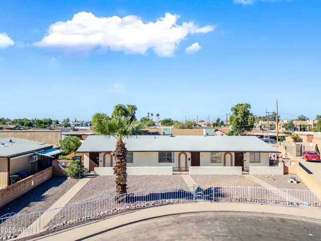 a view of a terrace with yard