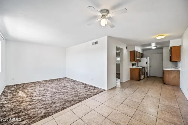 a kitchen with stainless steel appliances granite countertop a sink and a stove