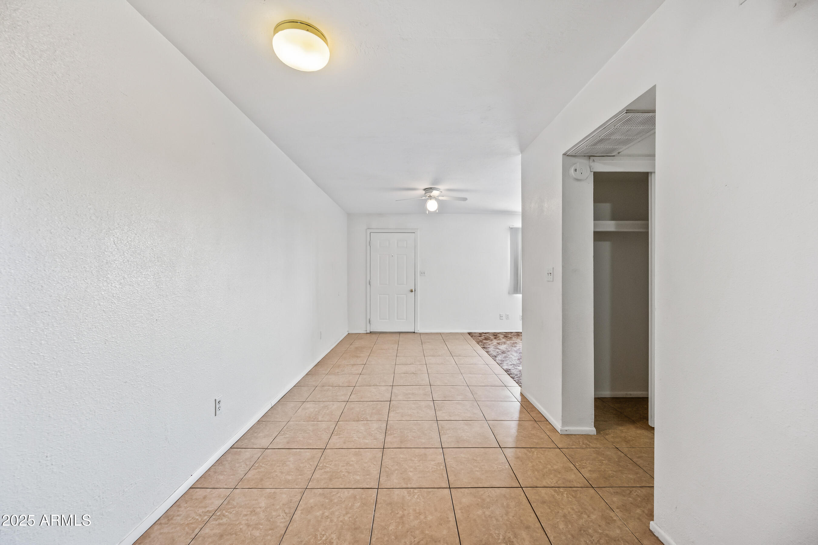 1138 North Dresden Circle Mesa, AZ 85203 - Photo 26 of 27 a view of an empty room and window