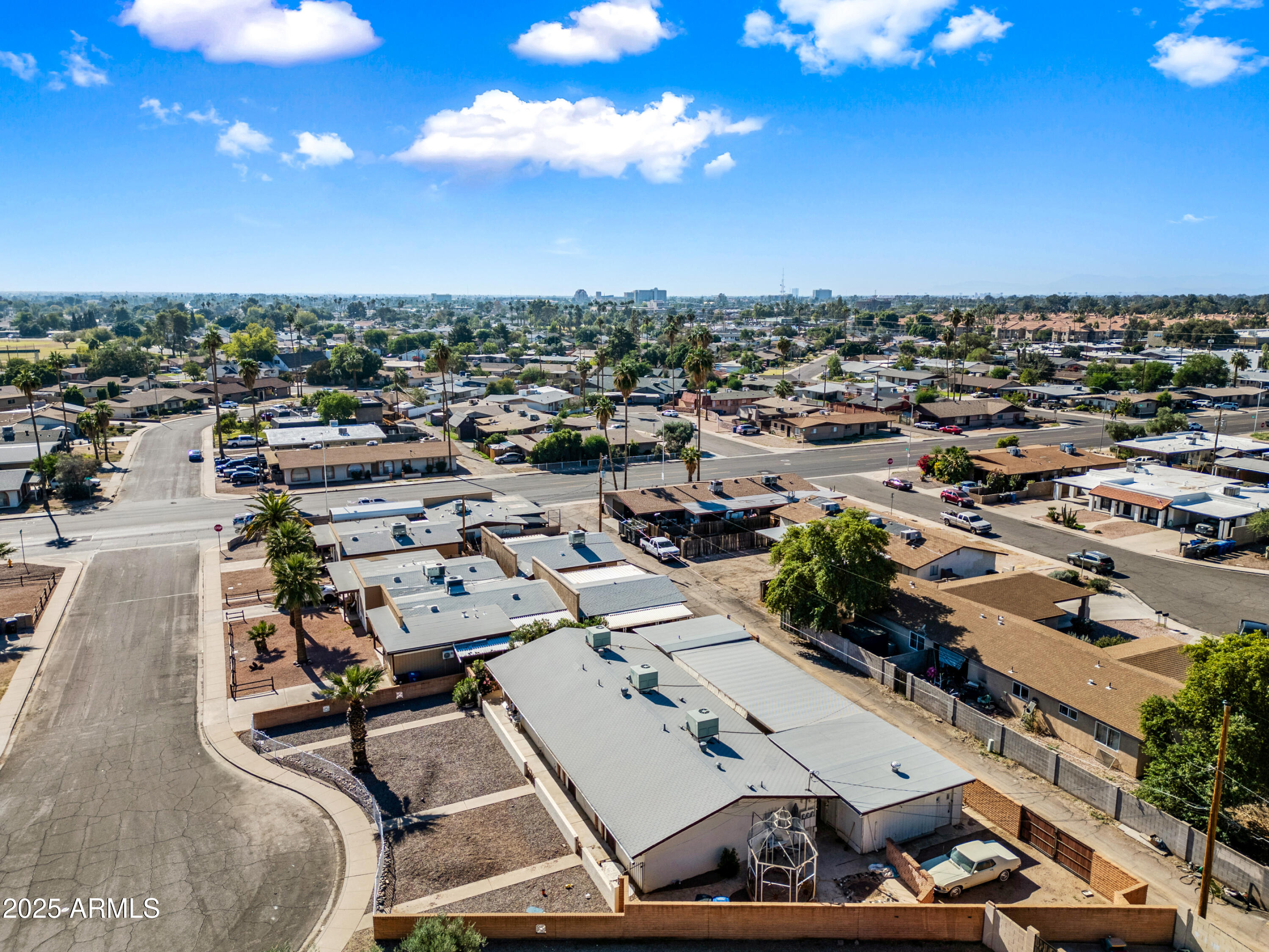 1138 North Dresden Circle Mesa, AZ 85203 - Photo 5 of 27 an aerial view of a residential houses with outdoor space