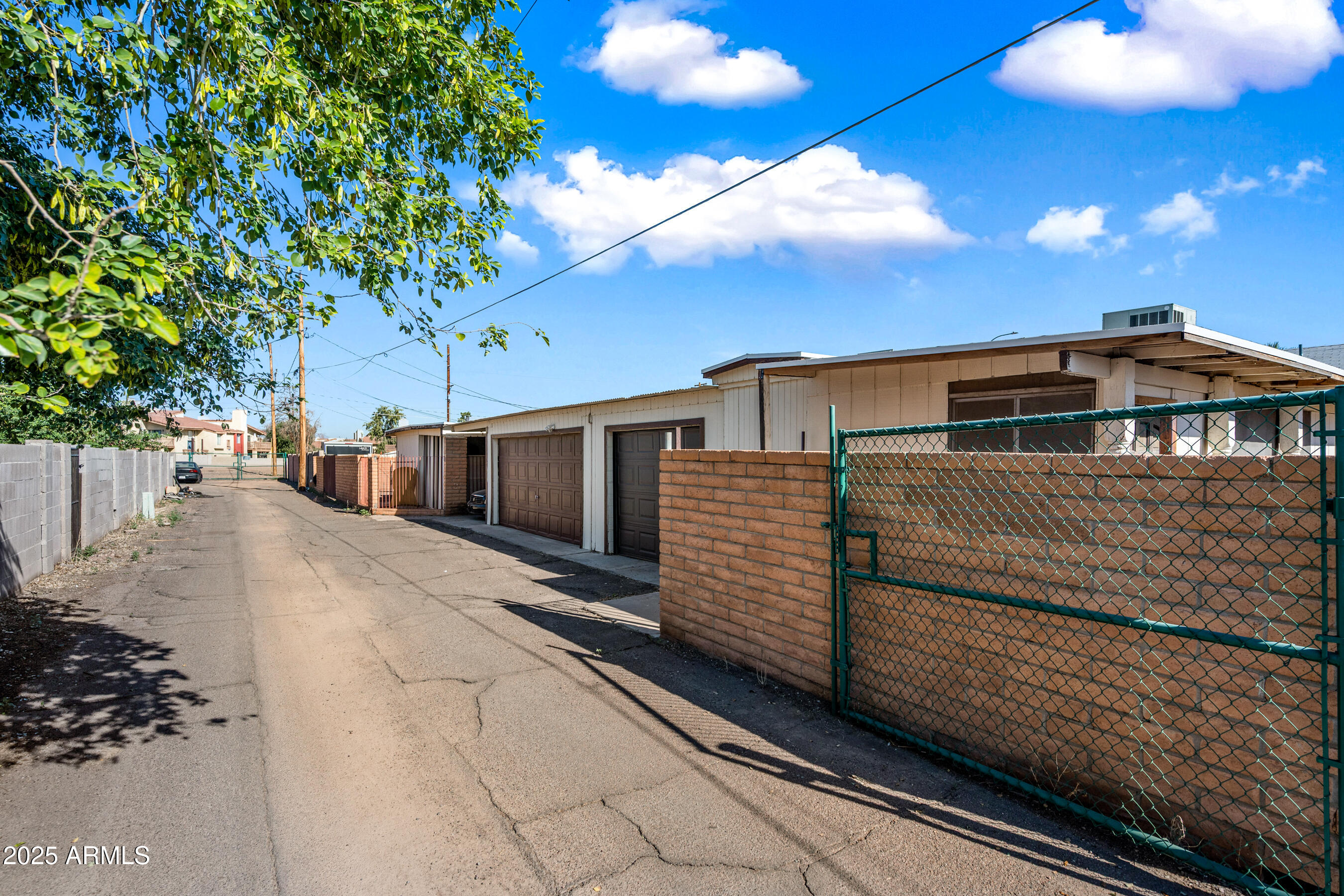 1138 North Dresden Circle Mesa, AZ 85203 - Photo 7 of 27 a view of a train that is sitting on the tracks