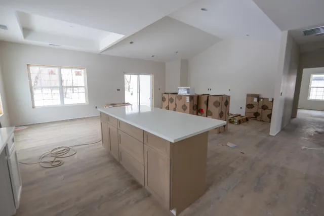 a view of kitchen with wooden floor