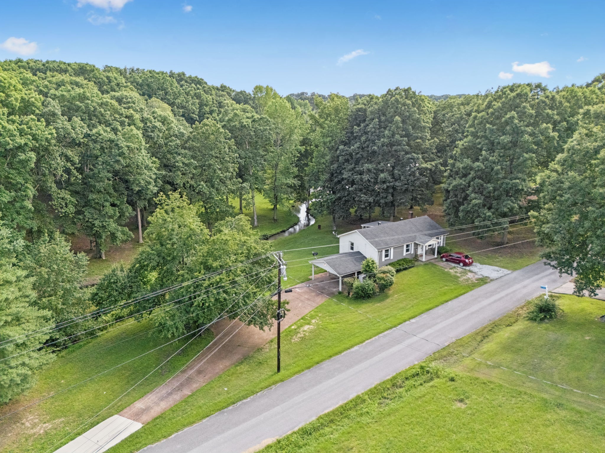 630 Lakeview Court Tennessee Ridge, TN 37178 - Photo 54 of 76 a view of a garden with an outdoor space