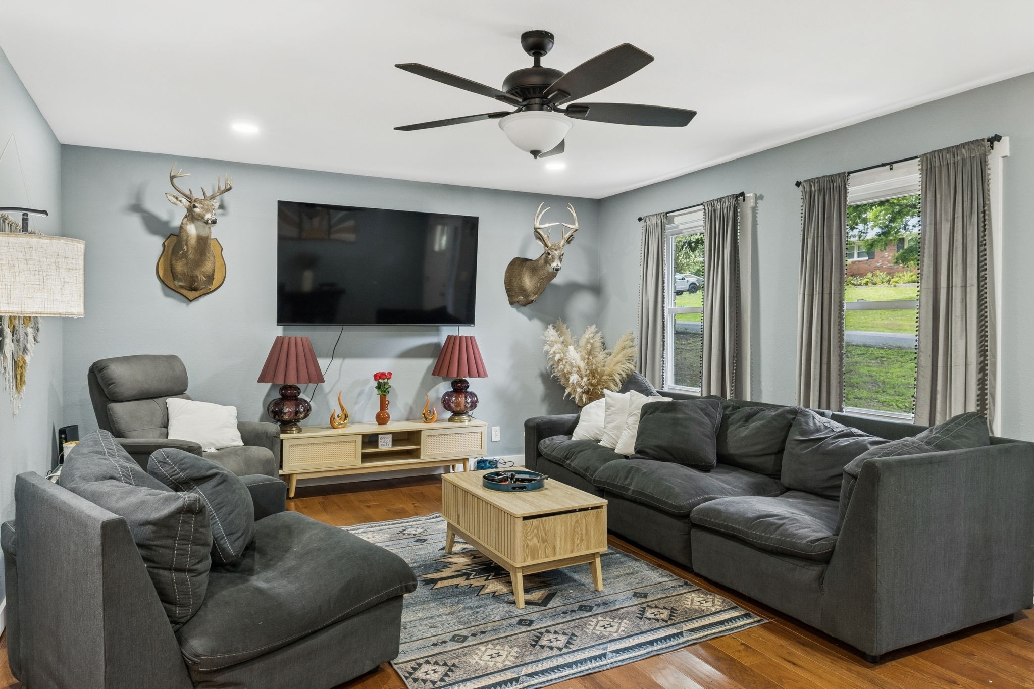 630 Lakeview Court Tennessee Ridge, TN 37178 - Photo 7 of 76 a living room with furniture and a flat screen tv