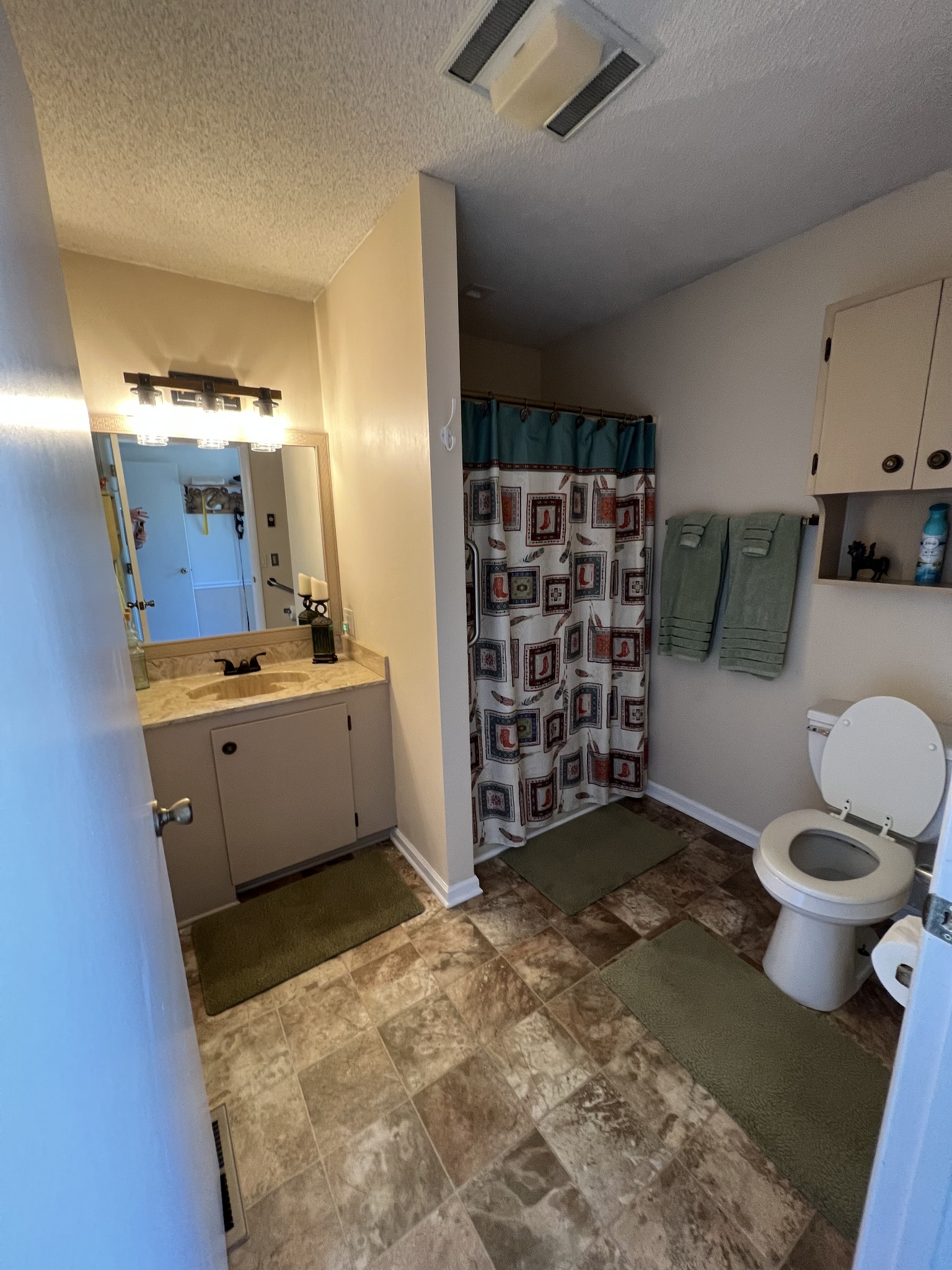 810 Rabbit Branch Road Shelbyville, TN 37160 - Photo 7 of 17 a view of a kitchen with a sink and cabinets