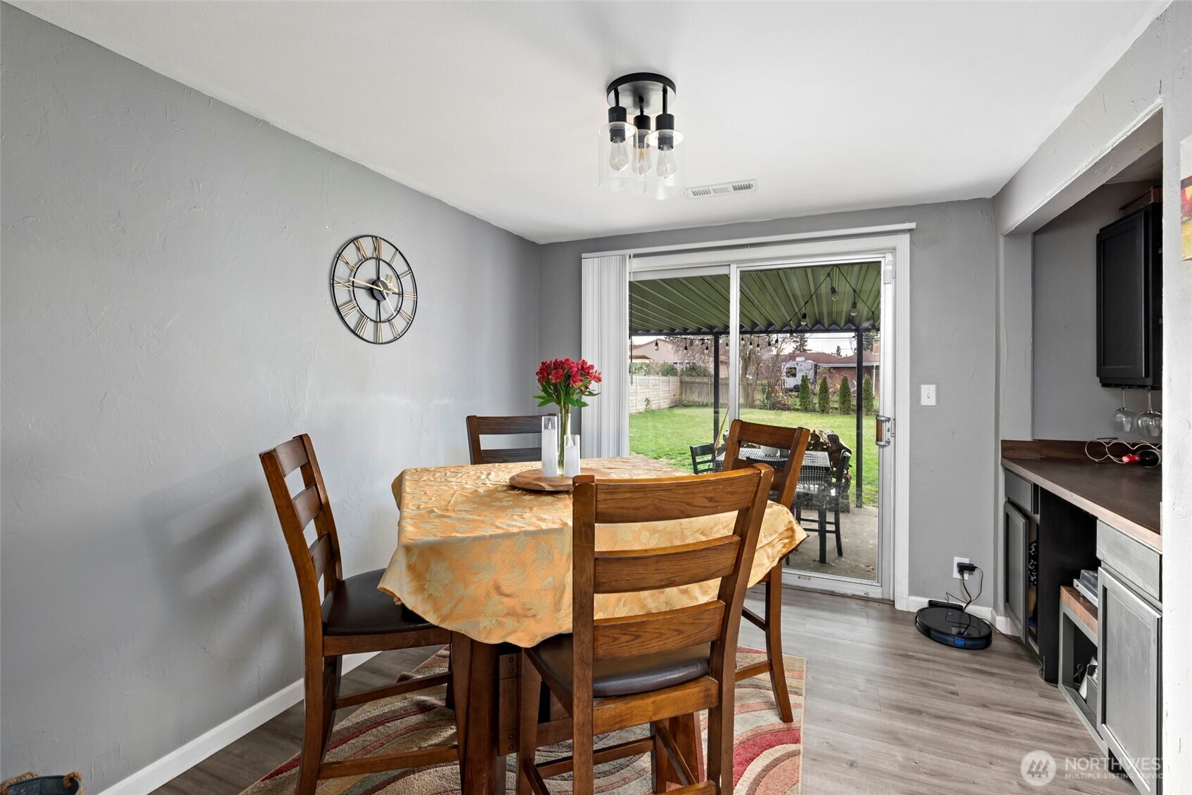 541 Southeast 5th Avenue Oak Harbor, WA 98277 - Photo 13 of 35 a dining room with furniture a flat screen tv and a window