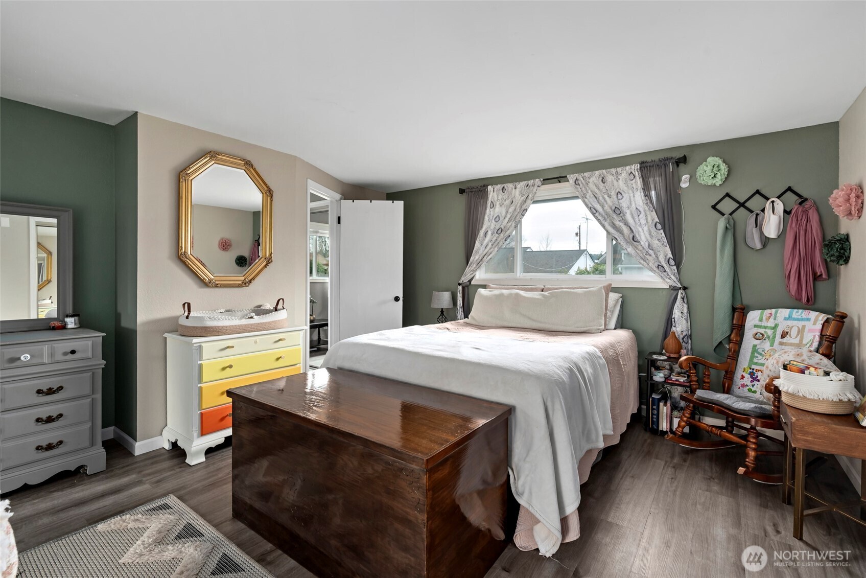 541 Southeast 5th Avenue Oak Harbor, WA 98277 - Photo 16 of 35 a bedroom with a bed a mirror and a window