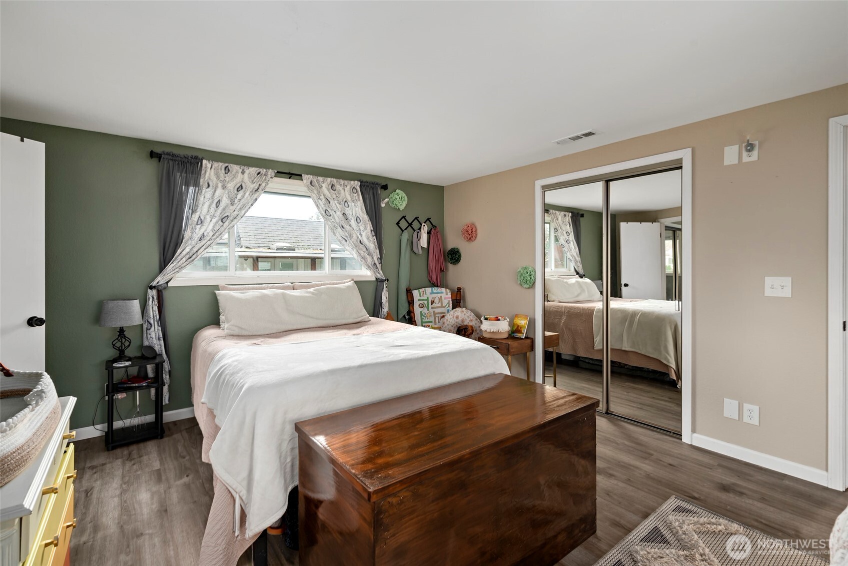 541 Southeast 5th Avenue Oak Harbor, WA 98277 - Photo 18 of 35 a bedroom with a bed and a large window