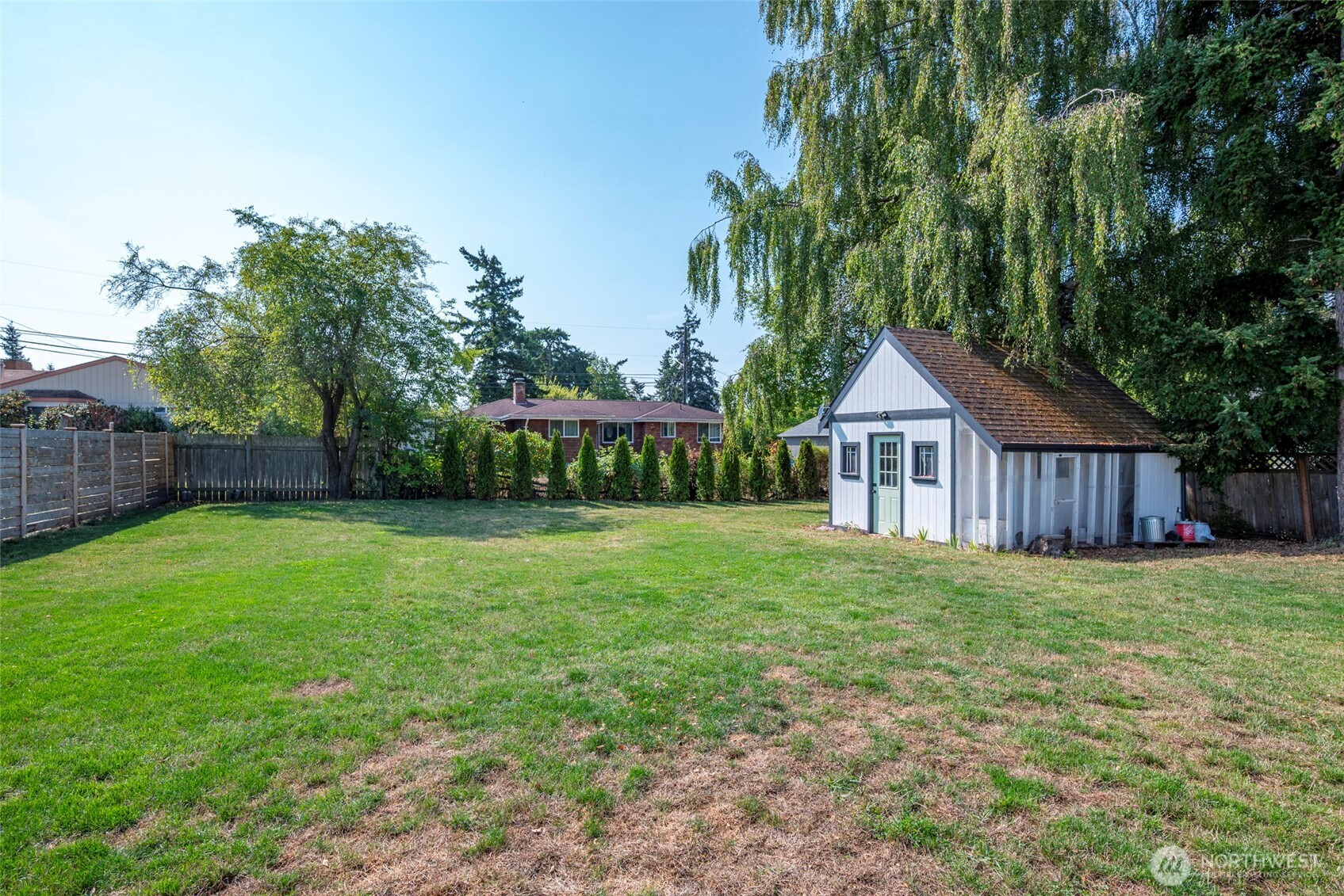 541 Southeast 5th Avenue Oak Harbor, WA 98277 - Photo 31 of 35 a view of a house with a yard