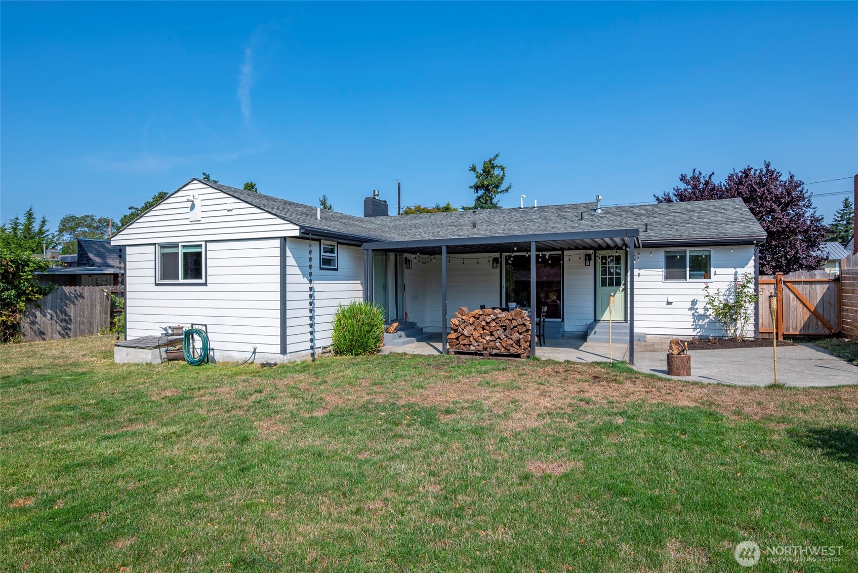 541 Southeast 5th Avenue Oak Harbor, WA 98277 - Photo 35 of 35 a front view of a house with a garden and yard