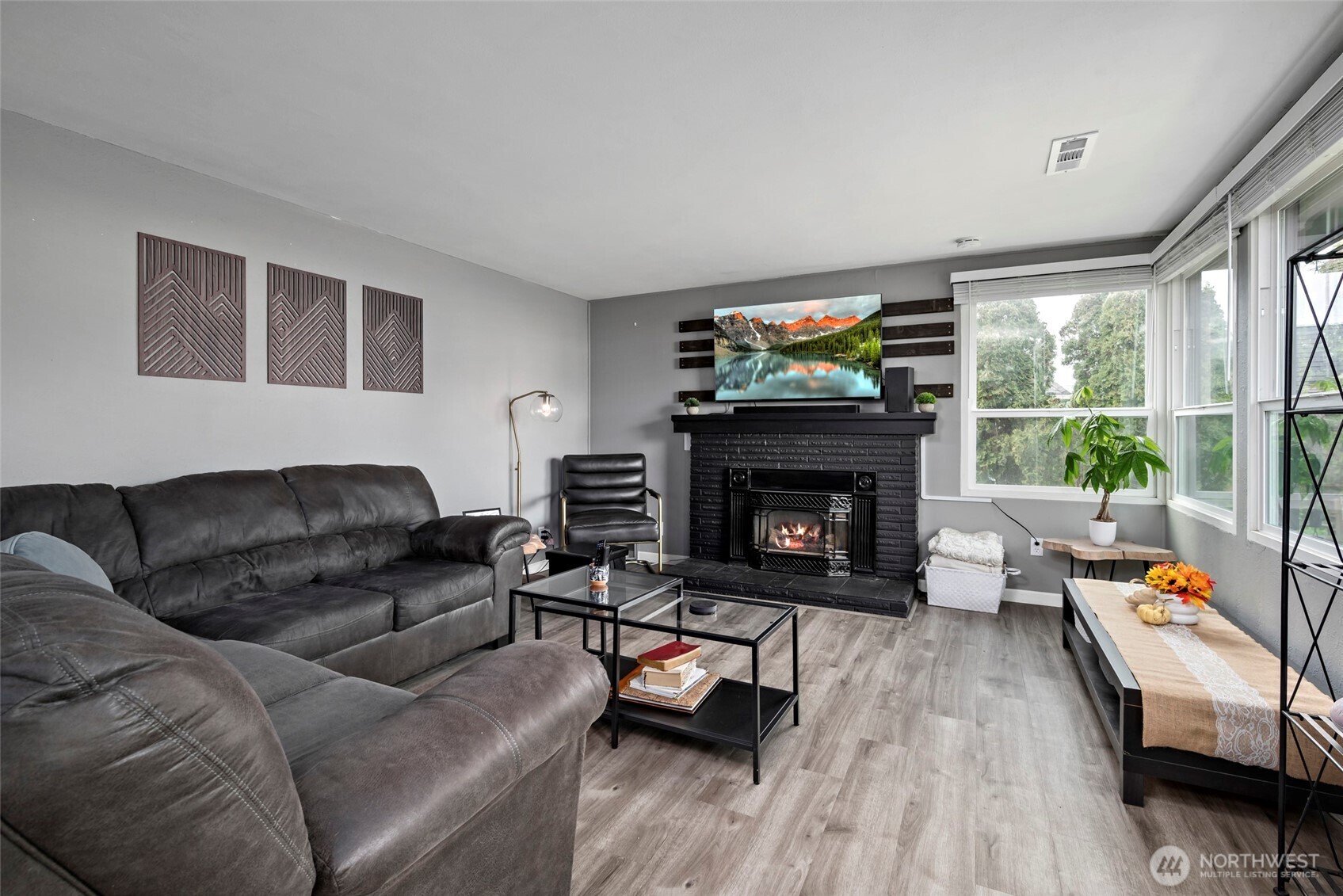 541 Southeast 5th Avenue Oak Harbor, WA 98277 - Photo 6 of 35 a living room with furniture and a fireplace