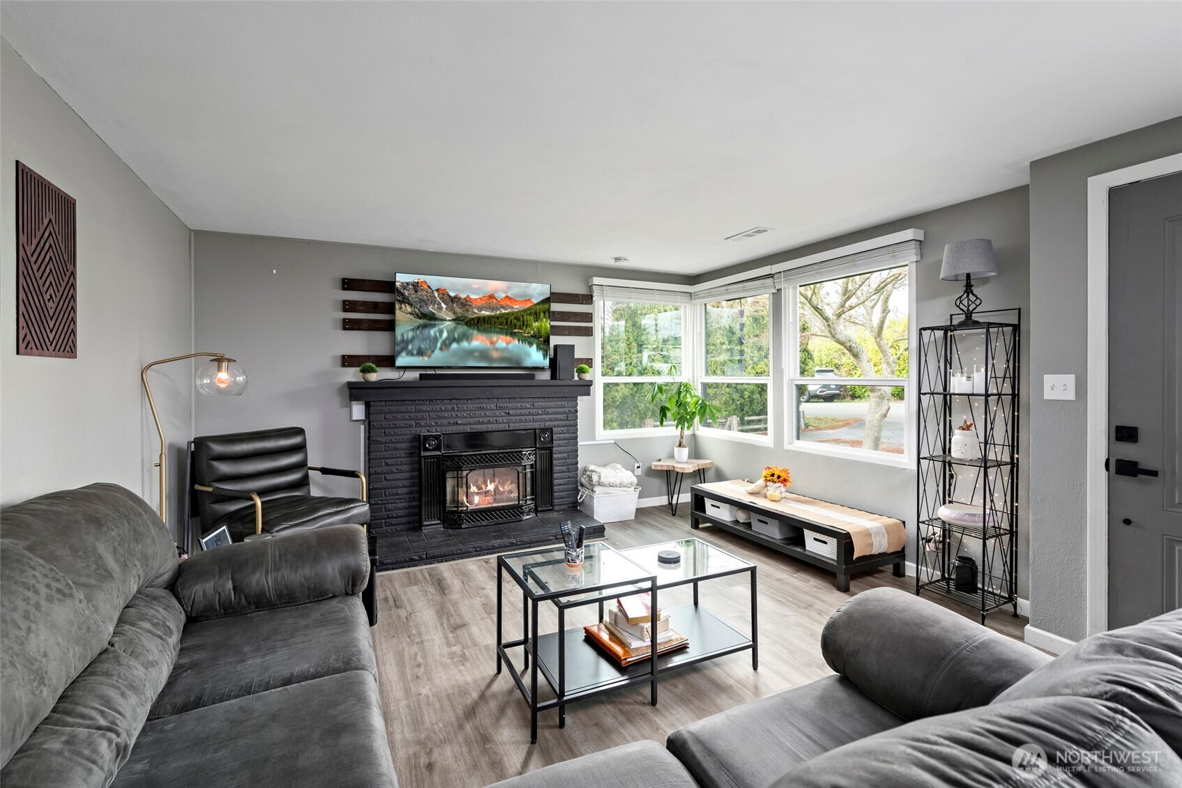 541 Southeast 5th Avenue Oak Harbor, WA 98277 - Photo 7 of 35 a living room with furniture and a fireplace