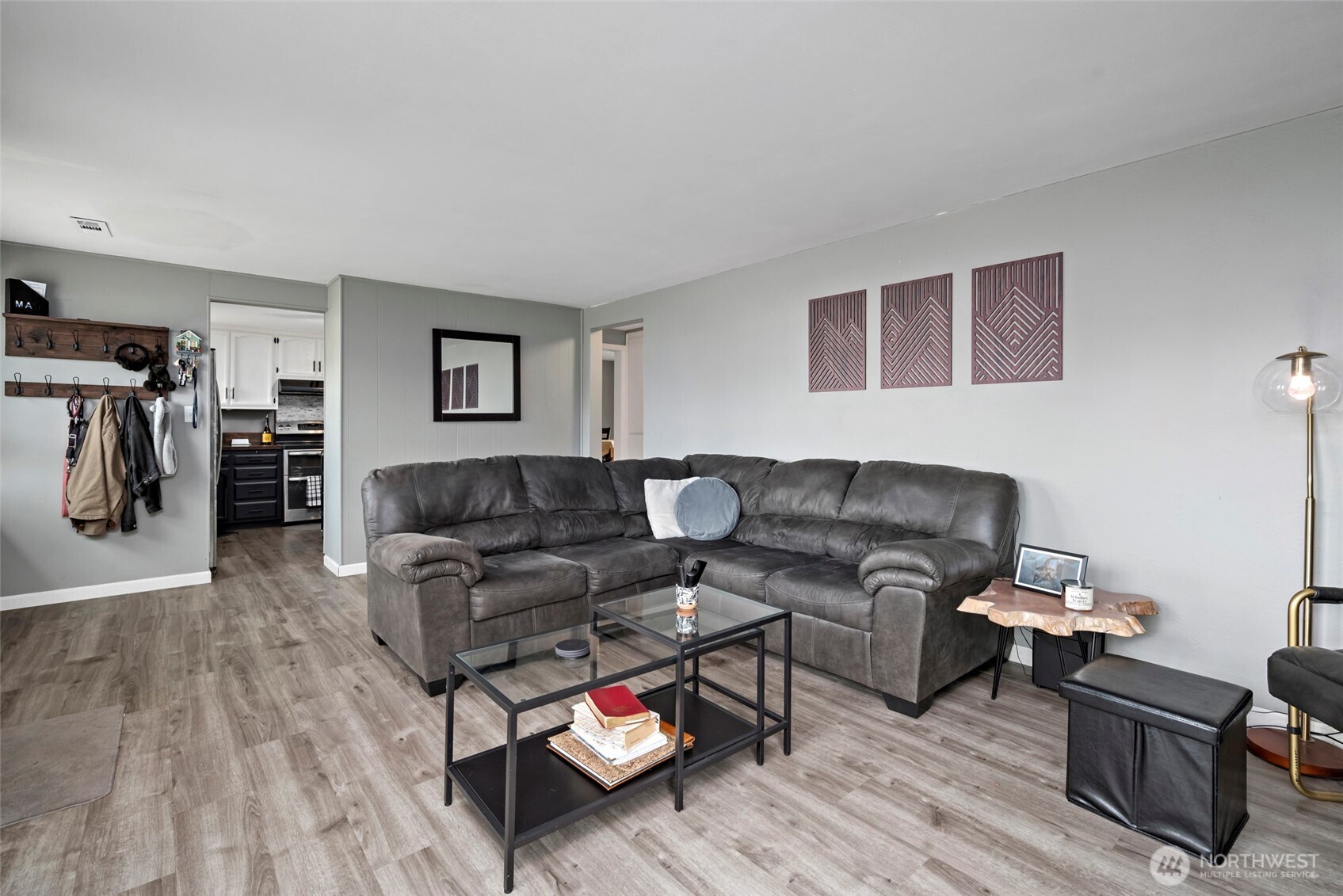 541 Southeast 5th Avenue Oak Harbor, WA 98277 - Photo 8 of 35 a living room with furniture and a wooden floor