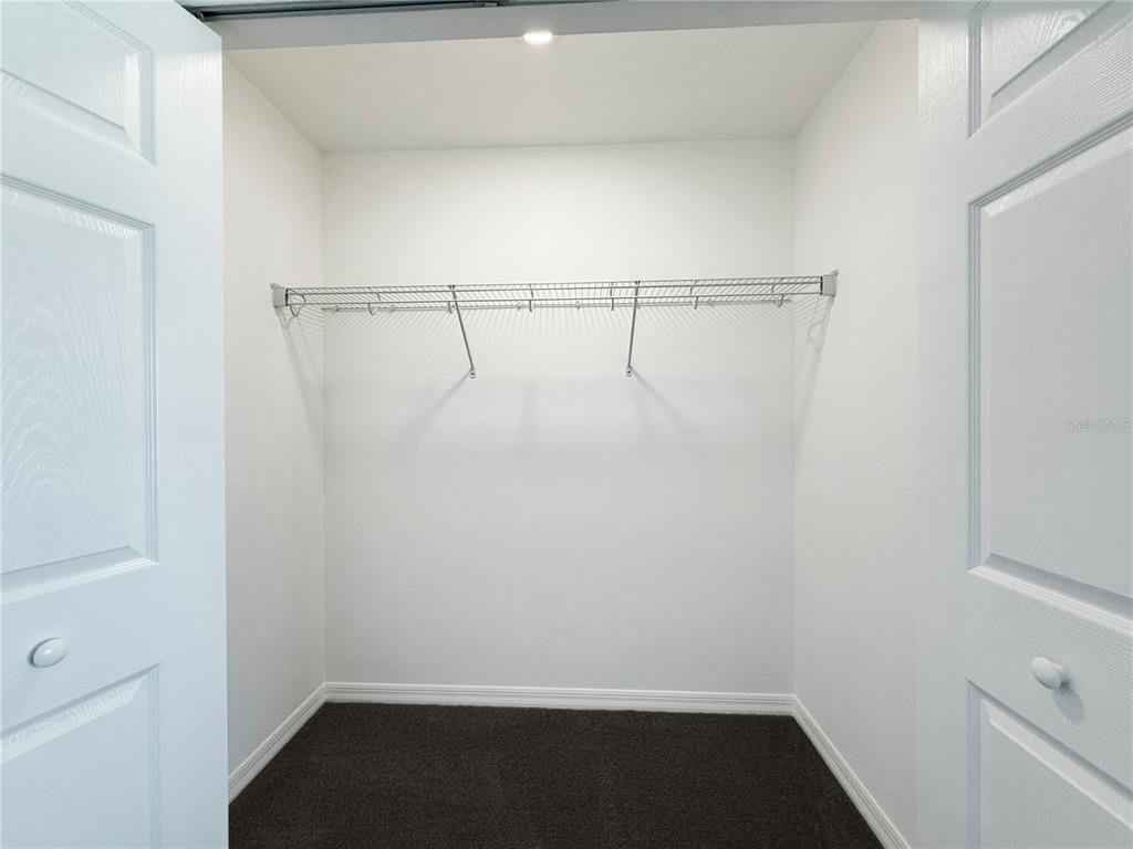 3023 Adams Cross Drive Zephyrhills, FL 33540 - Photo 11 of 36 a view of small space with racks on the wall