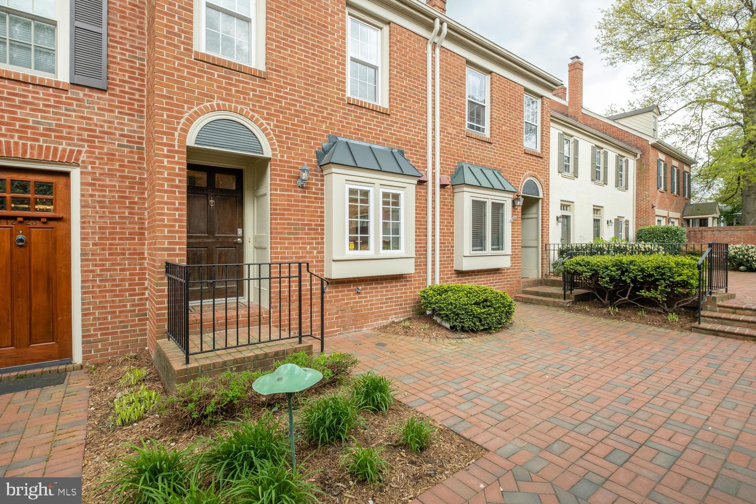 a front view of a house having yard