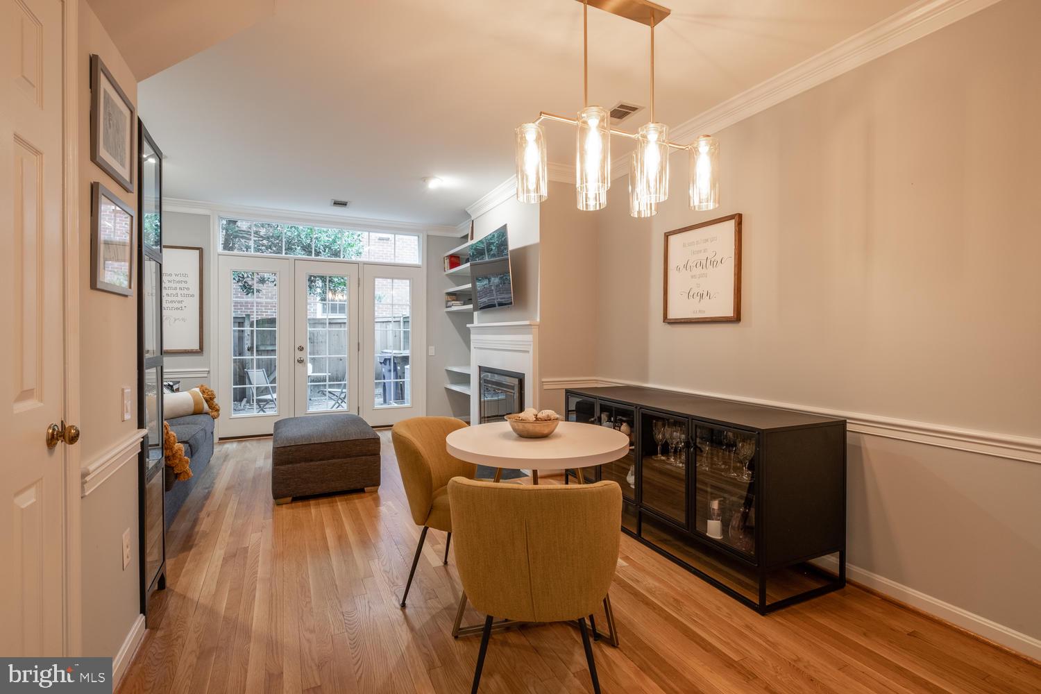 1221 Portner Road Alexandria, VA 22314 - Photo 11 of 34 a view of a dining room with furniture window and wooden floor