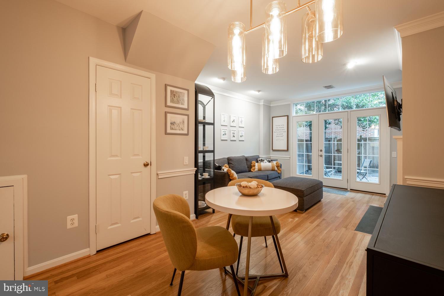 1221 Portner Road Alexandria, VA 22314 - Photo 12 of 34 a view of a dining room with furniture and wooden floor