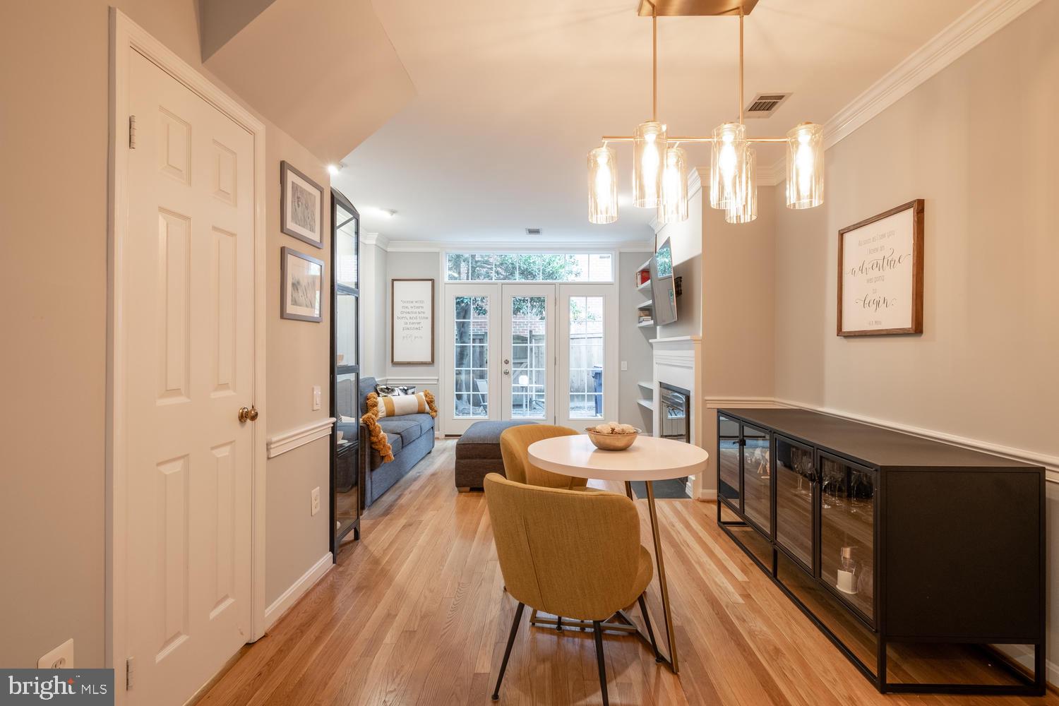 1221 Portner Road Alexandria, VA 22314 - Photo 13 of 34 a view of a dining room with furniture window and wooden floor