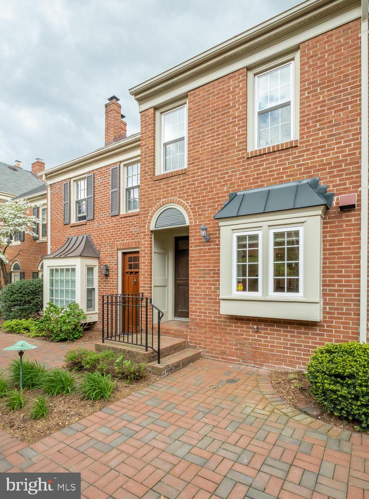 1221 Portner Road Alexandria, VA 22314 - Photo 2 of 34 a front view of a house with garden