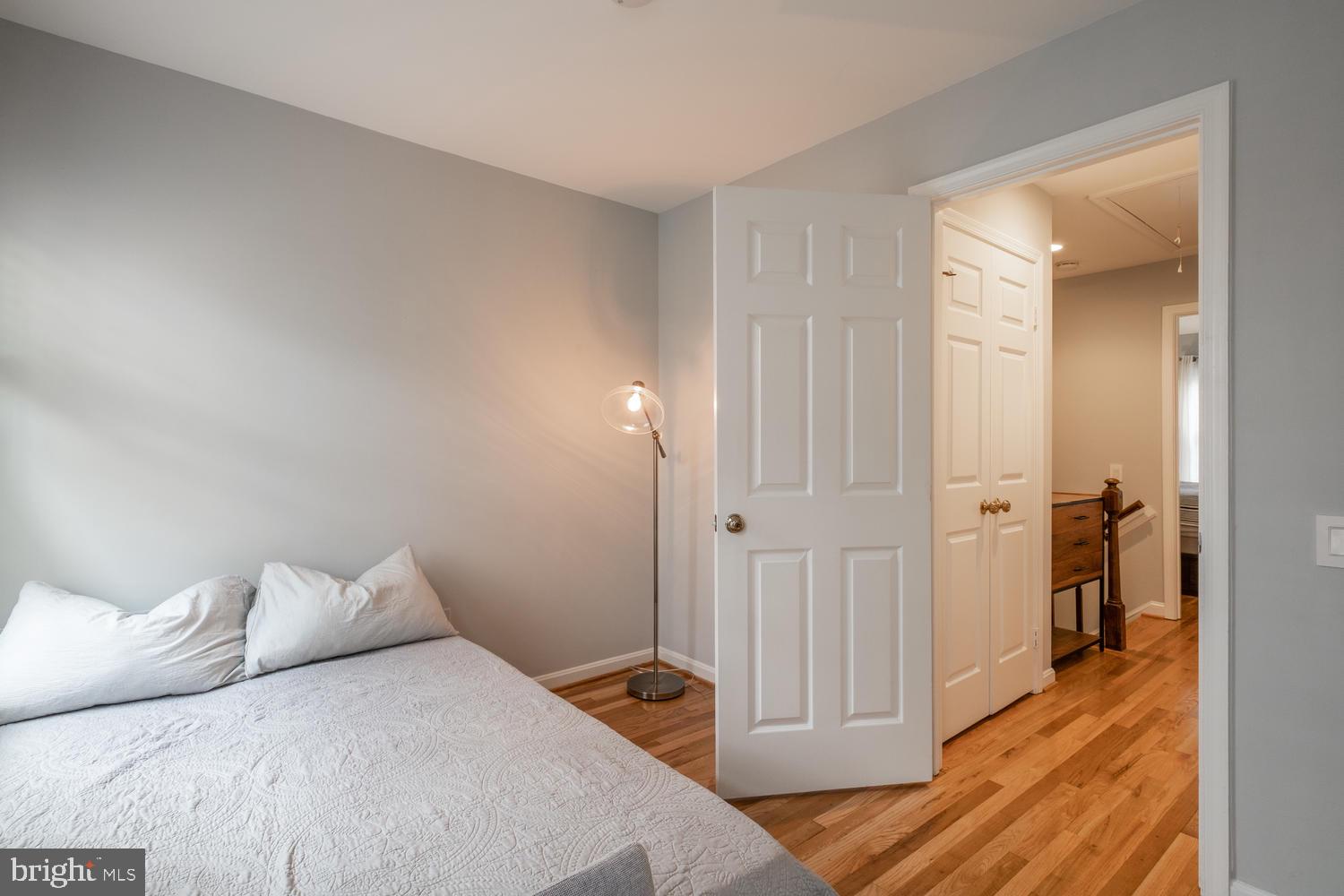 1221 Portner Road Alexandria, VA 22314 - Photo 27 of 34 a bedroom with a bed and a closet