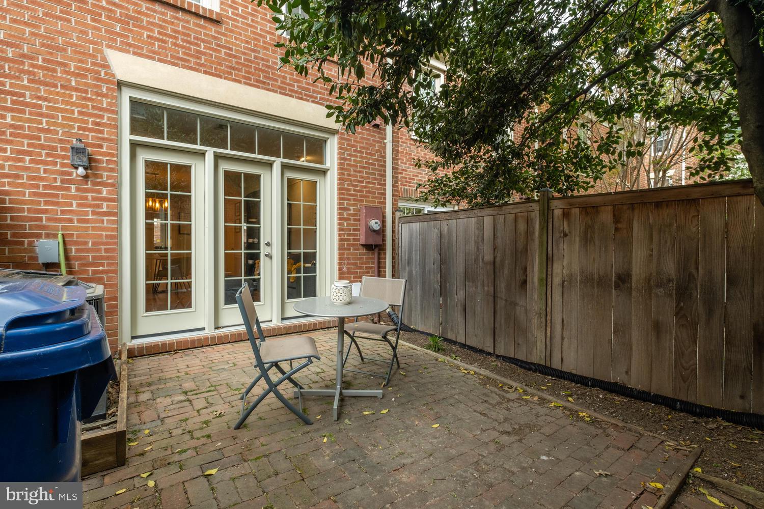 1221 Portner Road Alexandria, VA 22314 - Photo 30 of 34 a view of a house with backyard and sitting area