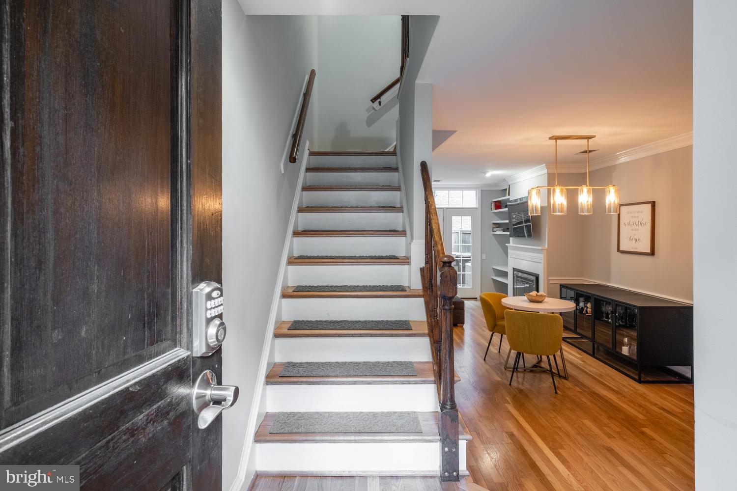 1221 Portner Road Alexandria, VA 22314 - Photo 3 of 34 a view of entryway and hall with wooden floor