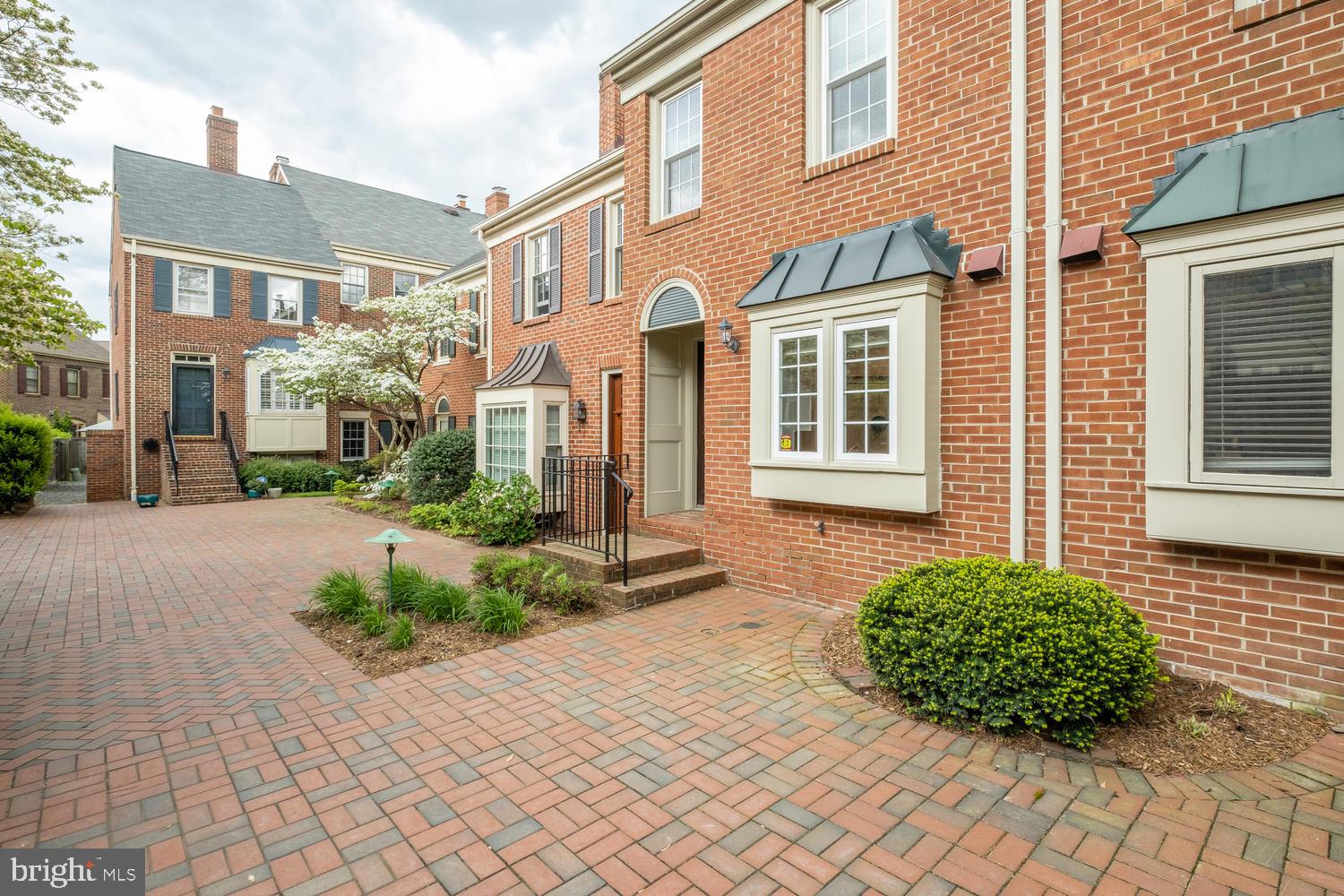 1221 Portner Road Alexandria, VA 22314 - Photo 32 of 34 a view of a brick house with a large windows