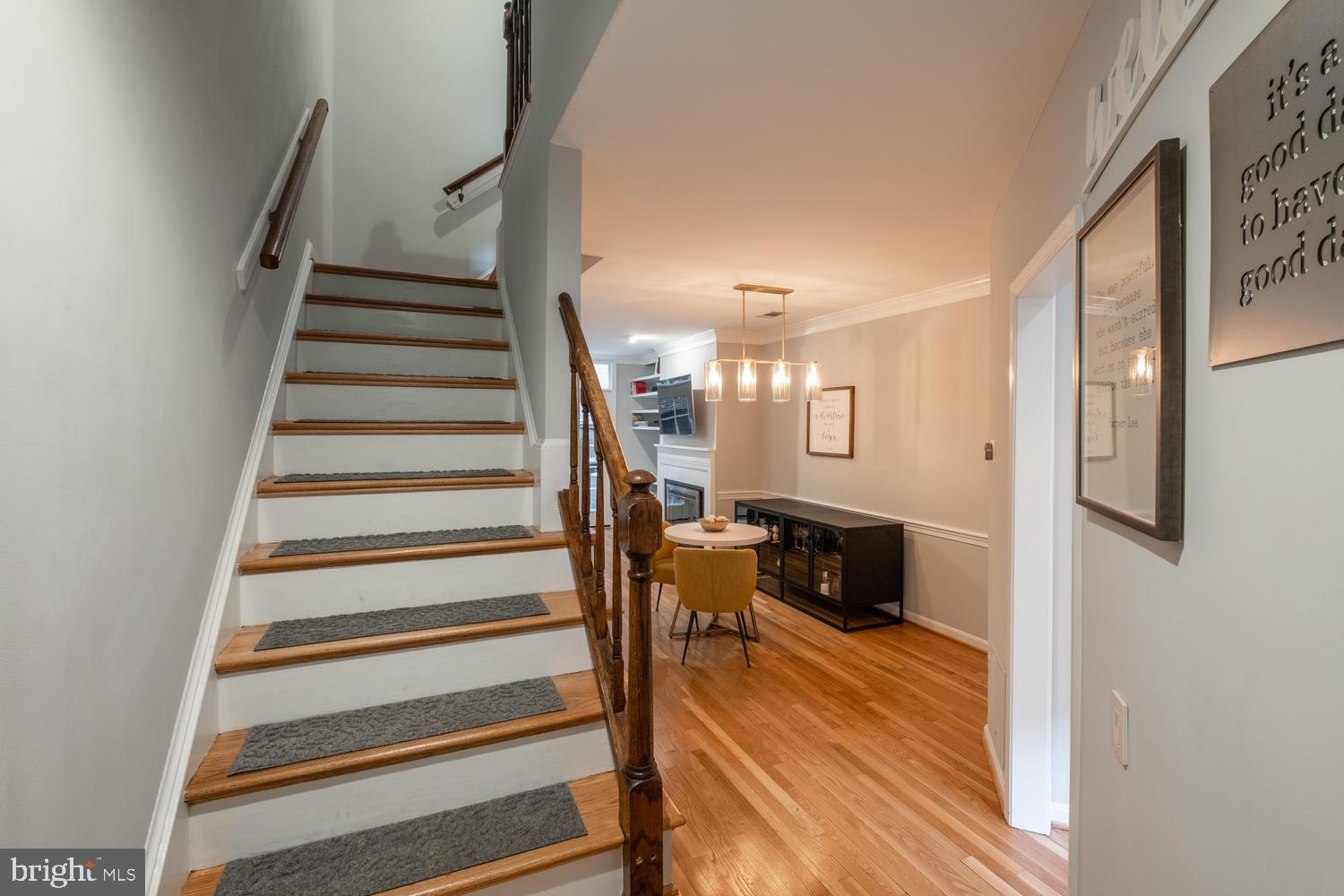 1221 Portner Road Alexandria, VA 22314 - Photo 4 of 34 a view of a living room with furniture and wooden floor