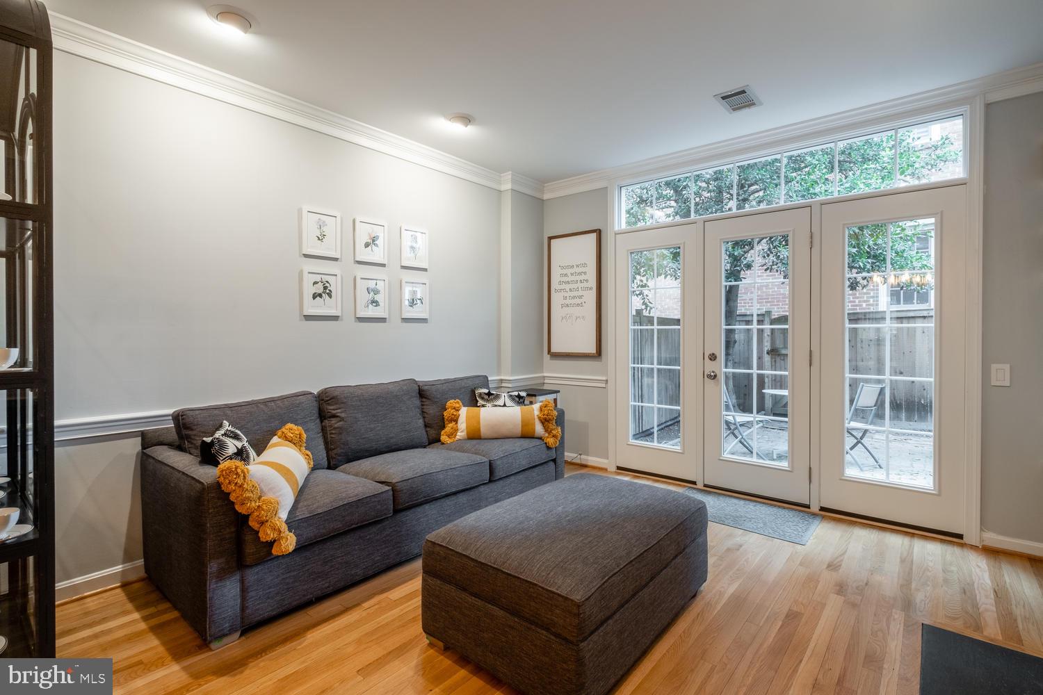 1221 Portner Road Alexandria, VA 22314 - Photo 8 of 34 a living room with furniture and a large window