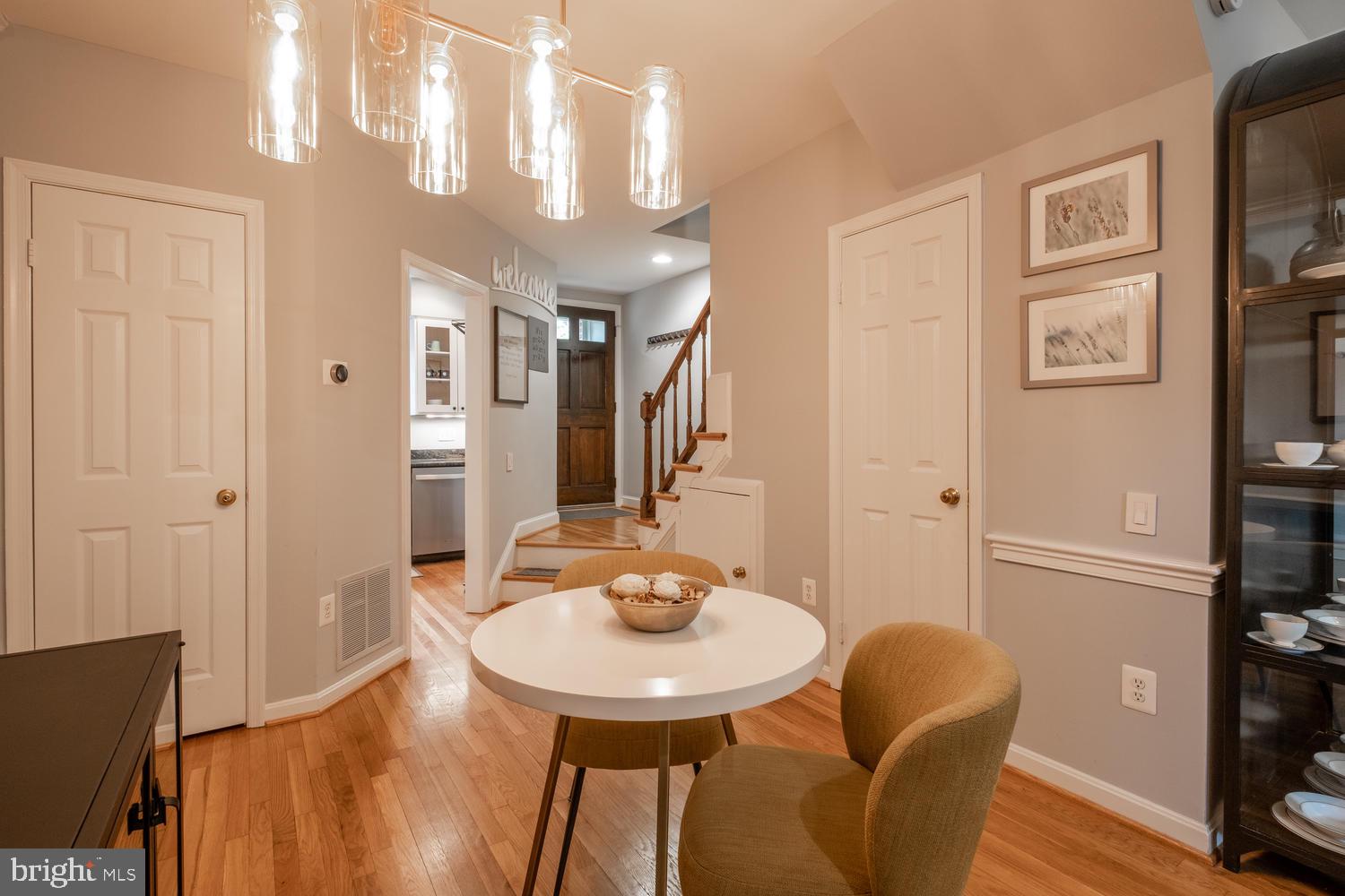 1221 Portner Road Alexandria, VA 22314 - Photo 9 of 34 a view of a dining room with furniture and wooden floor