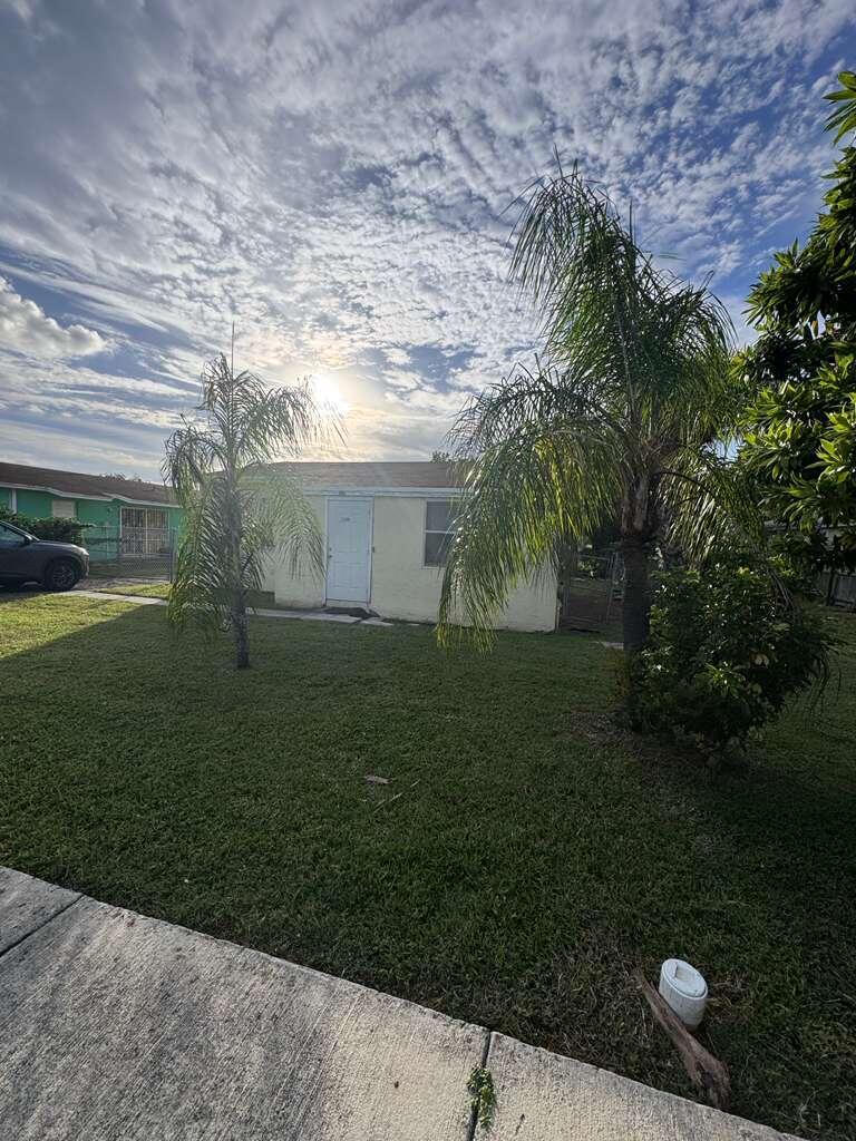 3309 Avenue South Riviera Beach, FL 33404 - Photo 14 of 17 a view of a backyard