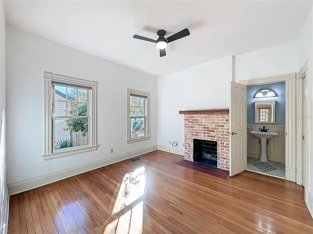 a kitchen with stainless steel appliances a refrigerator sink and cabinets